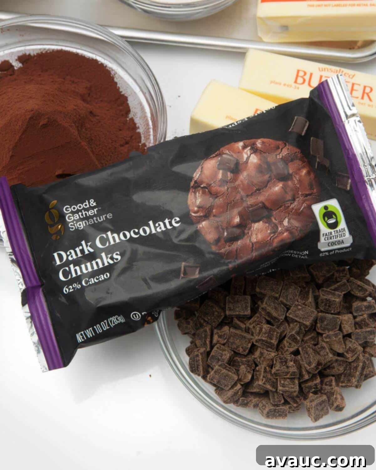 Assortment of dry ingredients for dark chocolate cookies, including flour and cocoa.