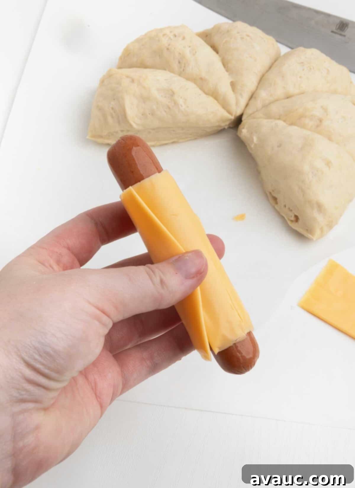 Pretzel Hot Dogs in a Flash 8 Hot dog wrapped with a slice of Kraft cheese.