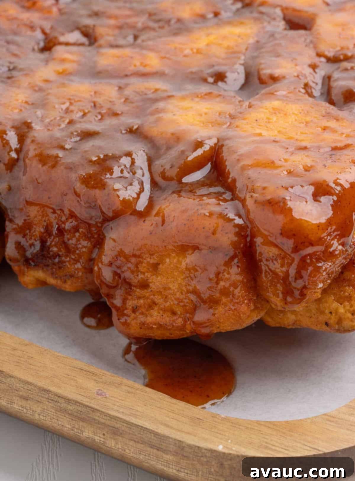 Monkey Bread in a 9x13 Pan 2 Gooey butterscotch monkey bread baked in a 9x13 pan, golden brown and glistening with sauce.