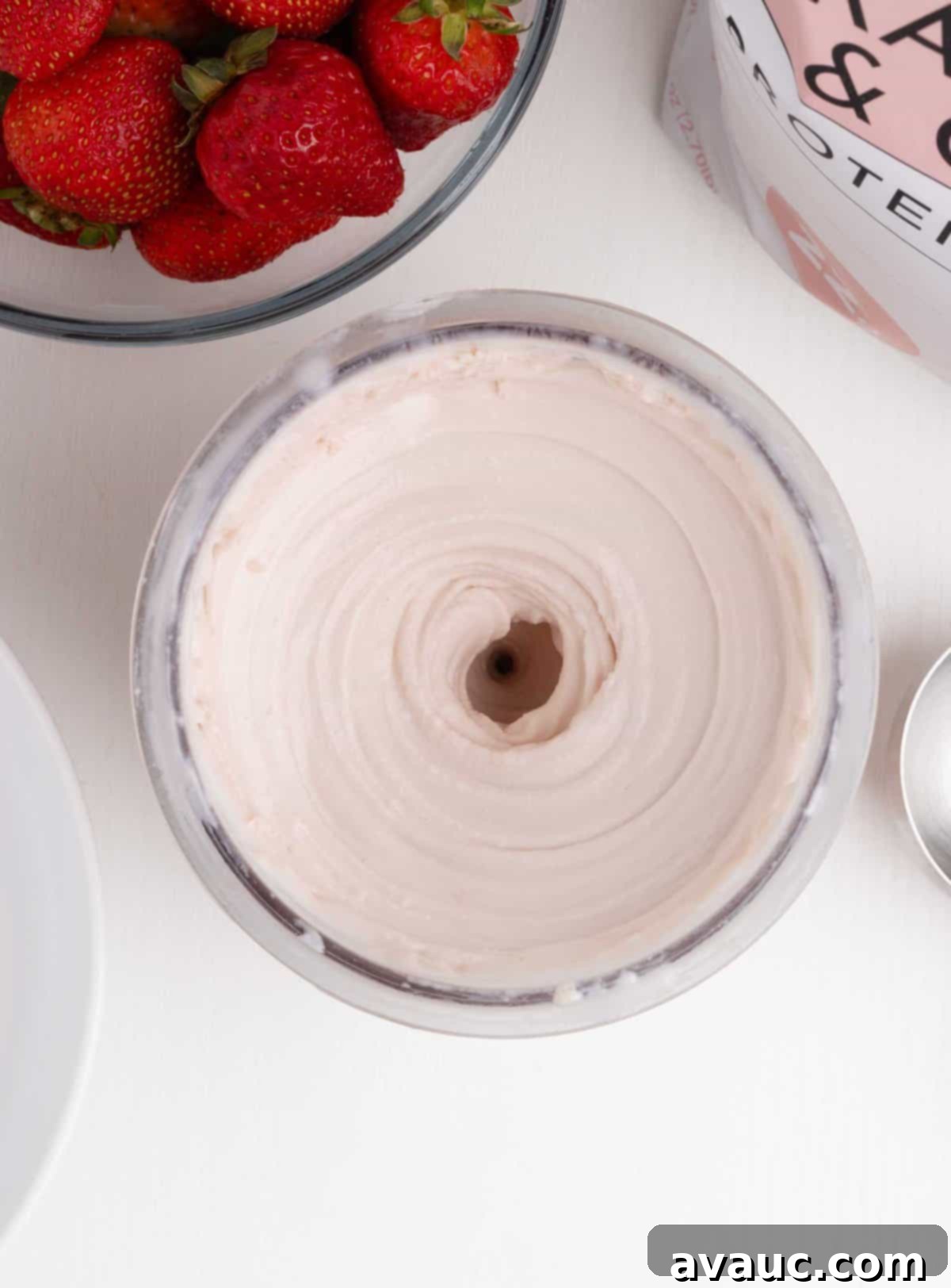 Ninja Creami Strawberry Protein Frozen Yogurt 7 Ninja Creami machine spinning strawberry frozen yogurt