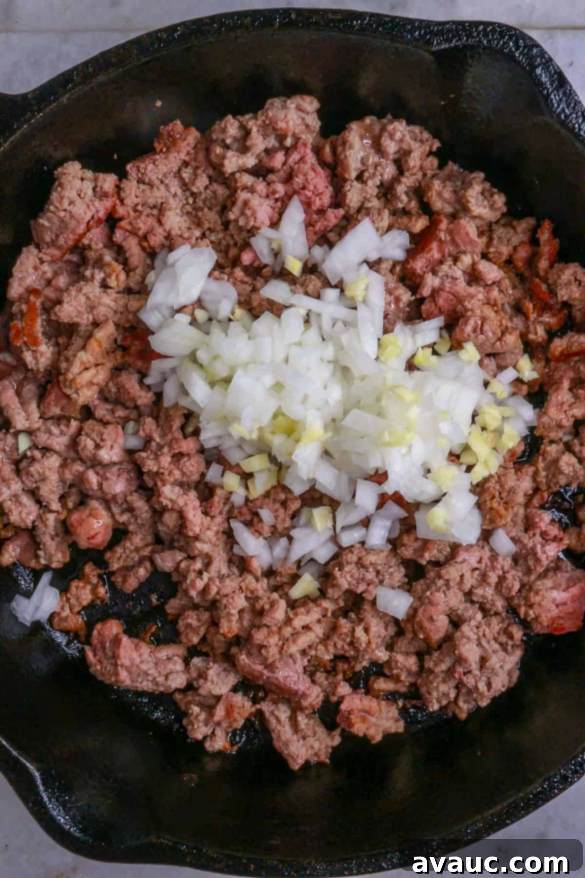 Loaded Cheesy Ground Beef Tortas 5 Sauté diced onion and garlic with the browning ground beef in a cast iron pan