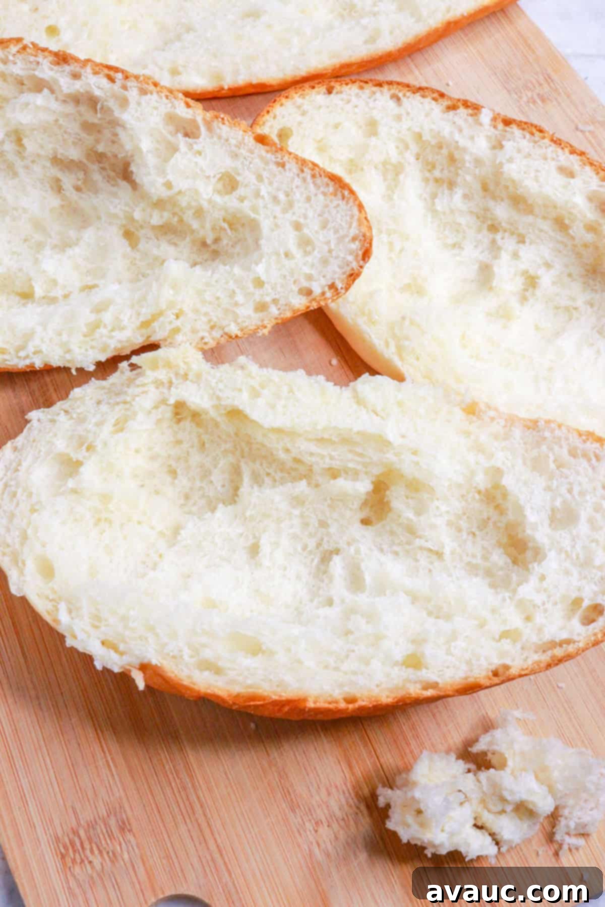 Loaded Cheesy Ground Beef Tortas 7 Mexican bolillo rolls cut lengthwise with the soft crumb scooped out, ready for filling