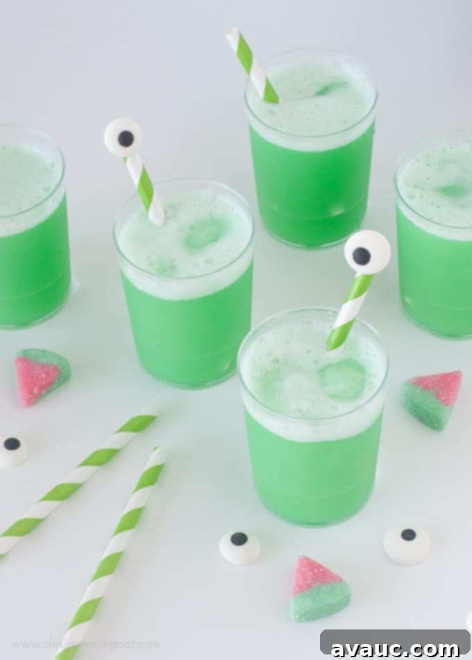 Halloween Watermelon Punch with DIY Eyeball Drink Stirrers, a perfect spooky drink for parties