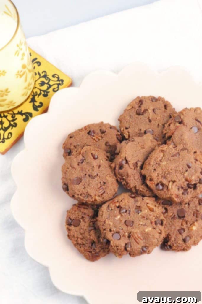 Delicious Double Chocolate Almond Flour Cookies piled high on a cooling rack, perfect for dipping. #almondflourcookies #doublechocolatecookies