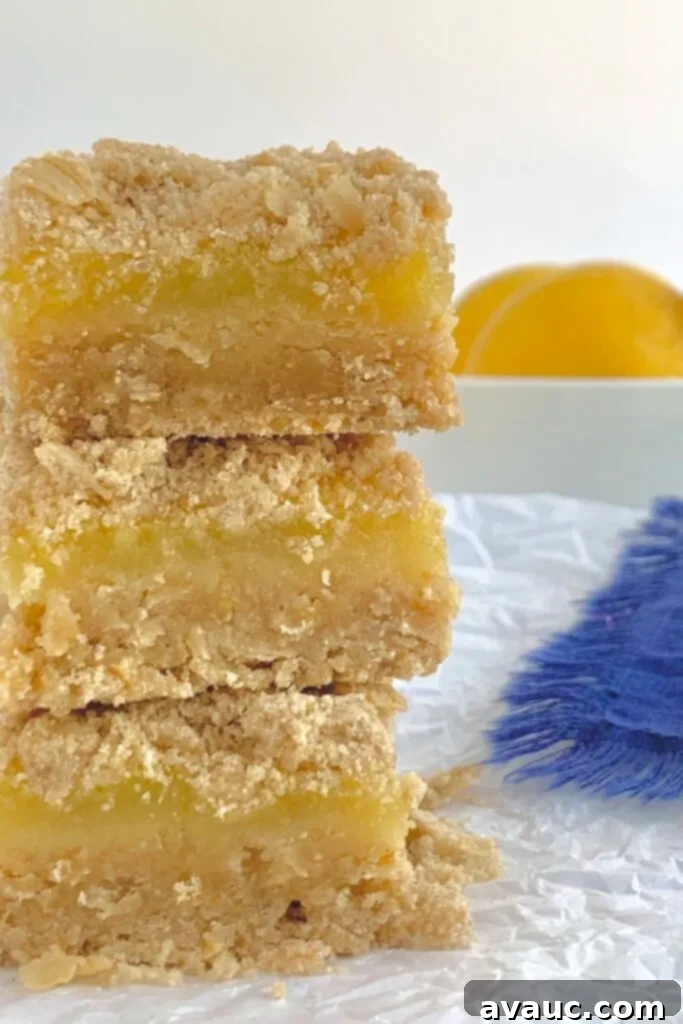 3 stacked lemon streusel bars.