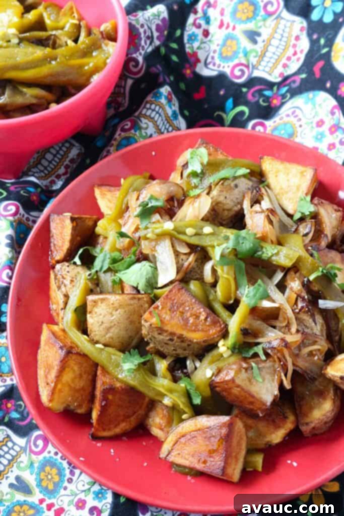 Smoky Grilled Peppers and Potatoes 4 Delicious Grilled Rajas con Papas served as a side dish, featuring smoky green chiles and crispy potatoes.