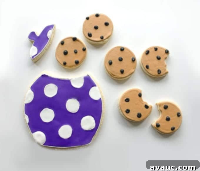 Adorable Sugar Cookies decorated as Chocolate Chip Cookies | by Little Bow Sweets for Design Eat Repeat