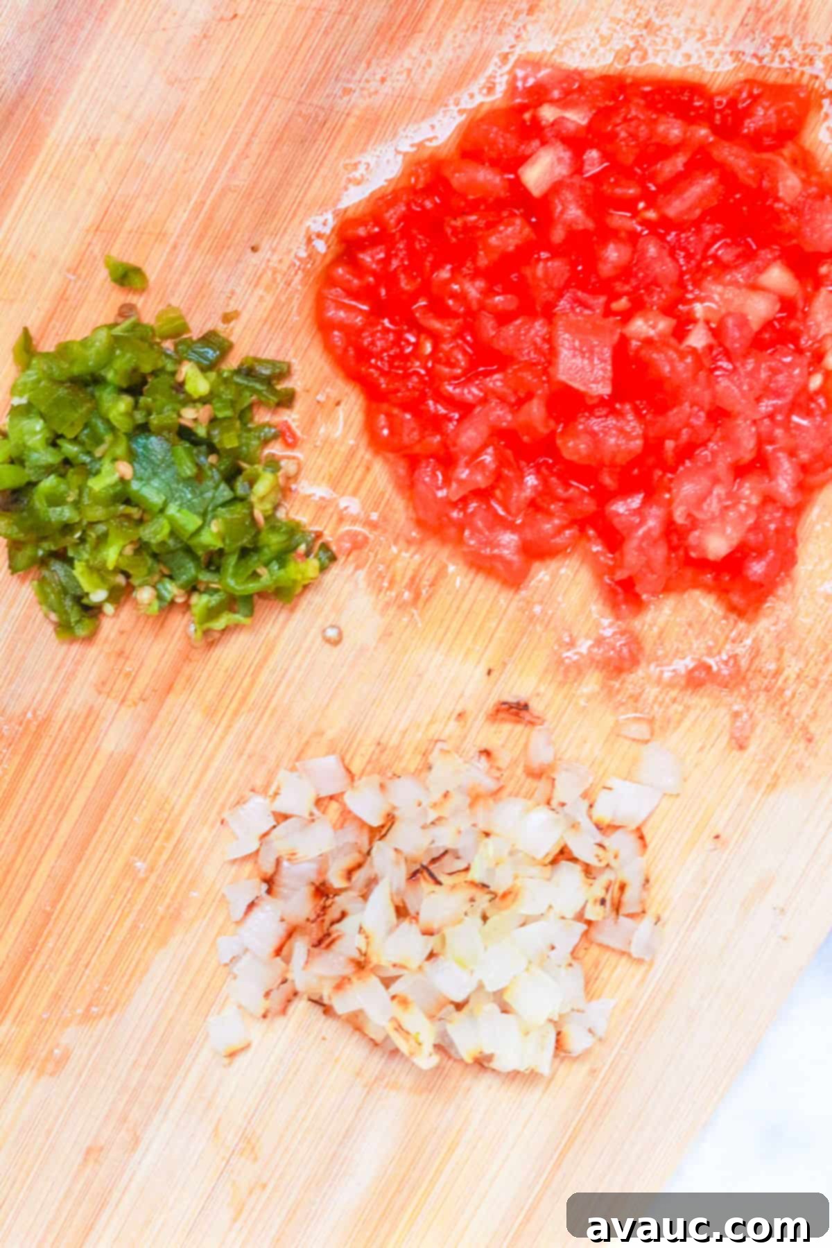 Smoky Simplicity Guacamole with Only Four Ingredients 6 Diced roasted vegetables on cutting board
