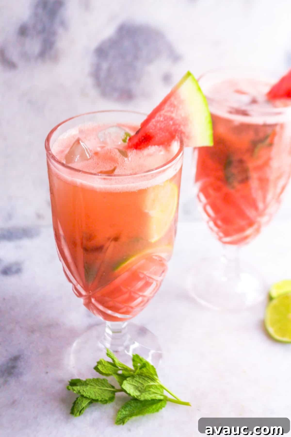 Two glasses with sparkling watermelon mint agua fresca