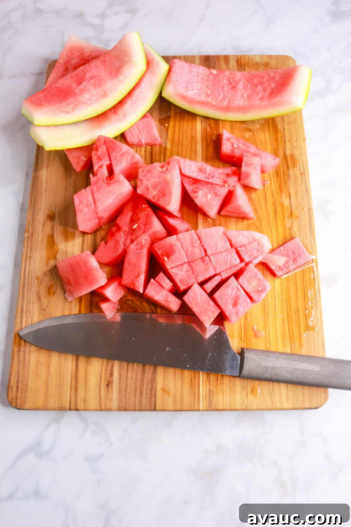 Chopped watermelon on a cutting board