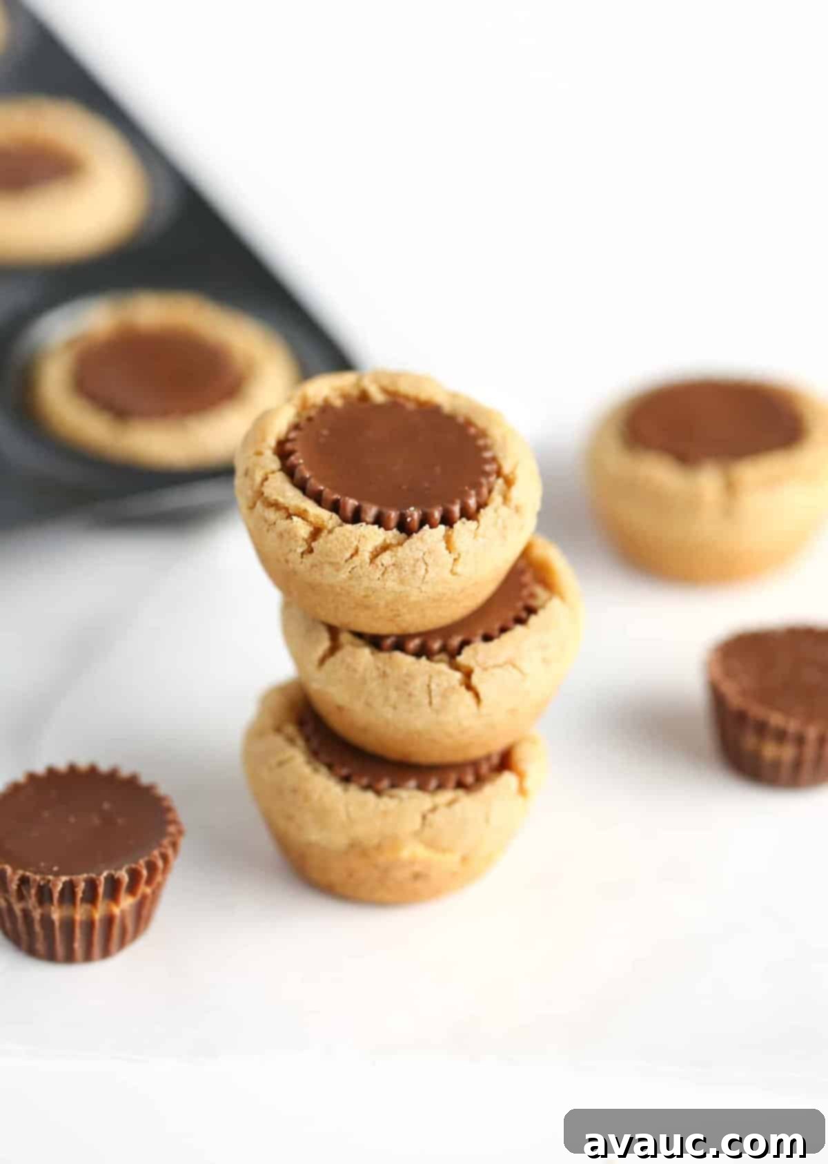 Reeses Peanut Butter Cookies 2 Batch of freshly baked Reese's Peanut Butter Cup Cookies in a mini muffin tin