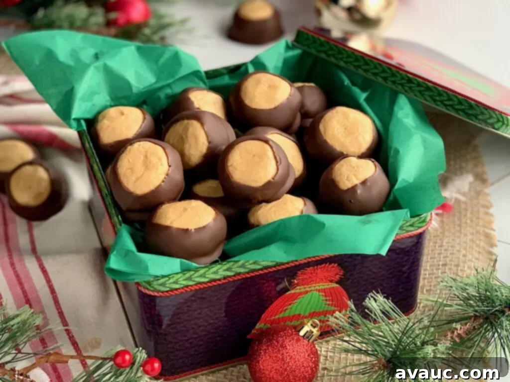 A Christmas tin filled with creamy peanut butter balls partially dipped in rich melted chocolate.