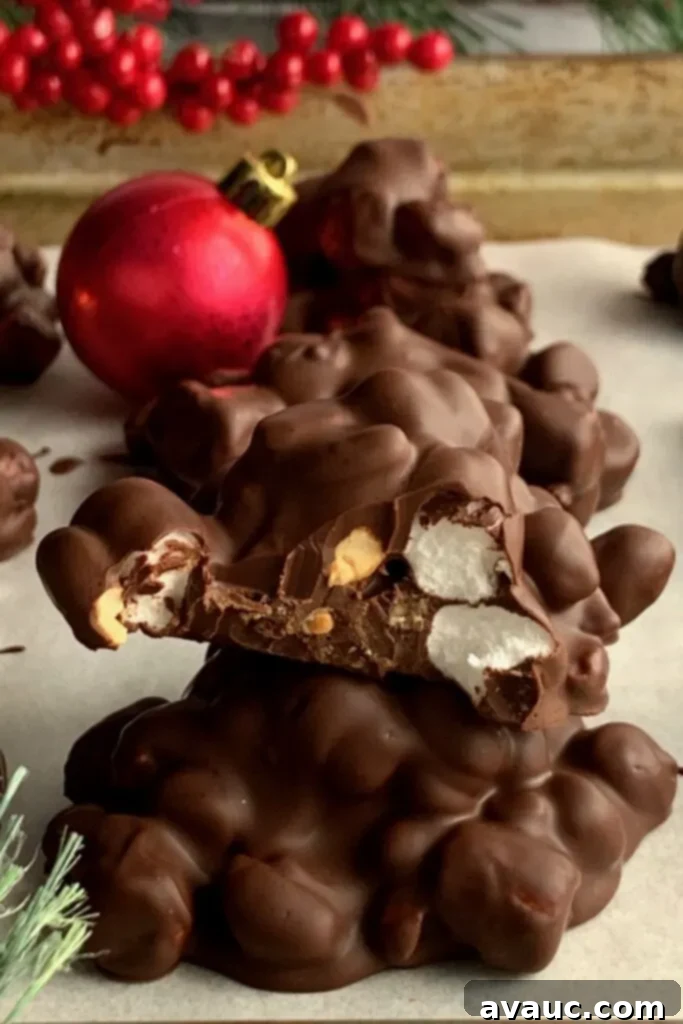 Irresistible clusters of melted chocolate mixed with mini marshmallows and crunchy peanuts, perfect for a quick festive treat.