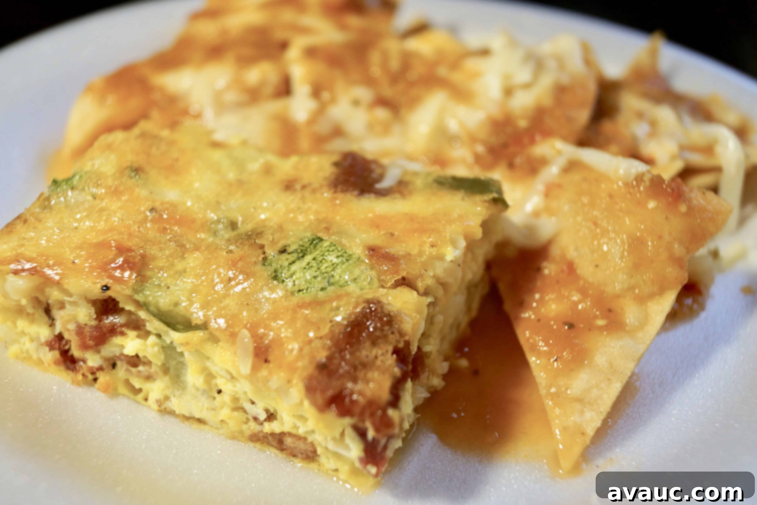Freshly baked Jalapeño Bacon Breakfast Casserole ready to be served. Hashtags: #jalapeñobaconbreakfastcasserole #breakfastcasserole #brunchrecipe #spicybreakfast