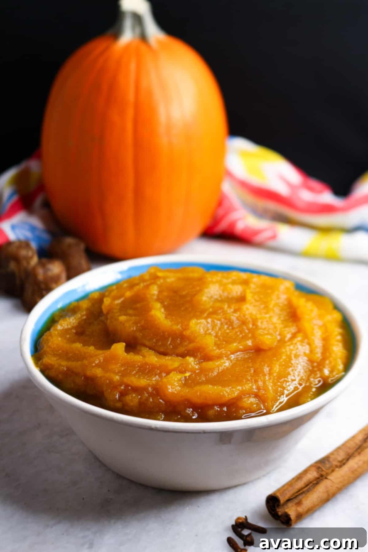 Pumpkin Empanada Filling 2 A vibrant orange pumpkin puree in a bowl, ready to be used in fall desserts like empanadas.