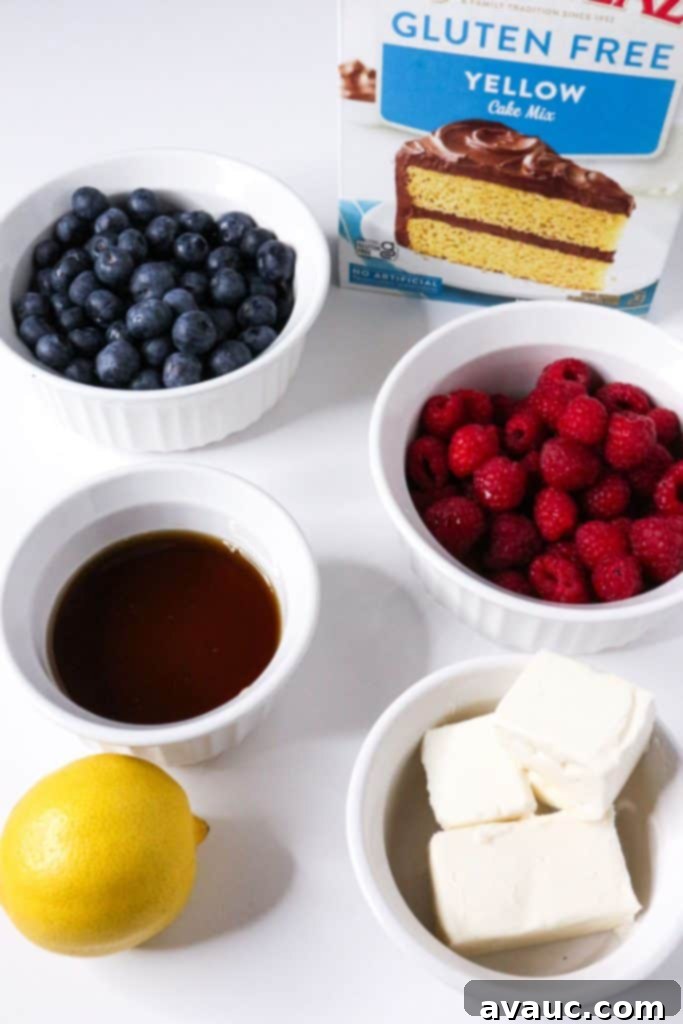Effortless Gluten-Free Dump Cake 3 Cake mix, blueberries, raspberries, maple syrup, lemon and butter
