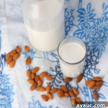Glass of almond milk and bottle of almond milk #homemadealmondmilk