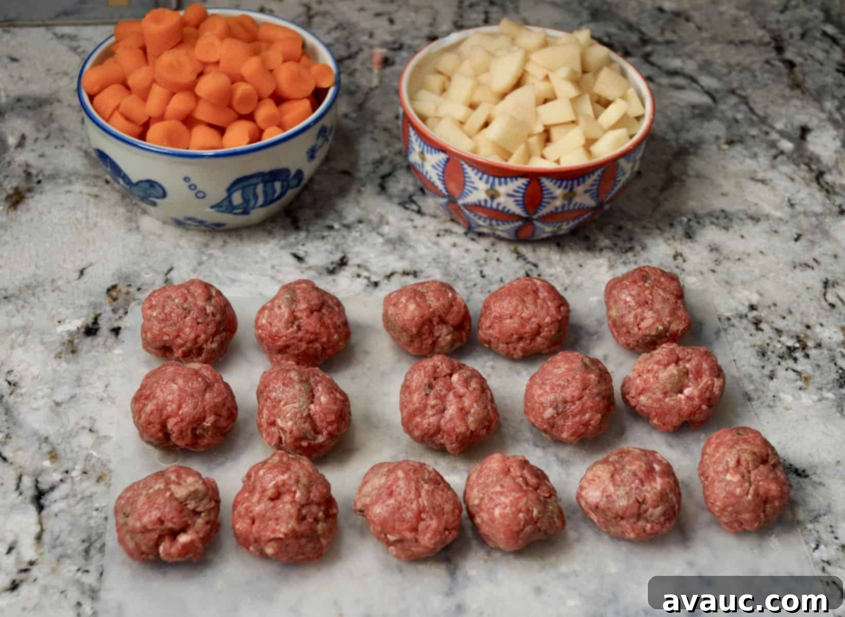 Hearty Mexican Meatball Soup 3 Raw meatballs with two bowls behind them, one with carrots and another with potatoes