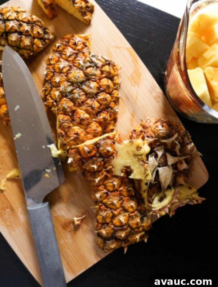 Fresh Pineapple Cooler 4 Step 1: Fresh pineapple is chopped into chunks, ready for blending.