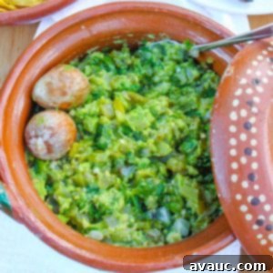 Smoky Roasted Green Chile Guacamole 9 Roasted Green Chile Guacamole in a brown Mexican bowl