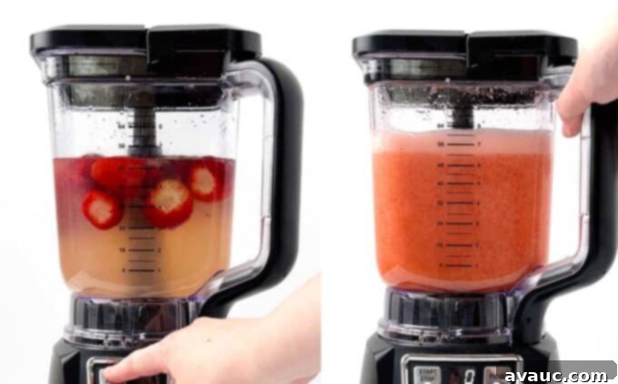 Zesty Strawberry Lemonade Pops 5 Blender in action, mixing fresh strawberries, lemon juice, sugar, and water to create the vibrant strawberry lemonade base for popsicles.