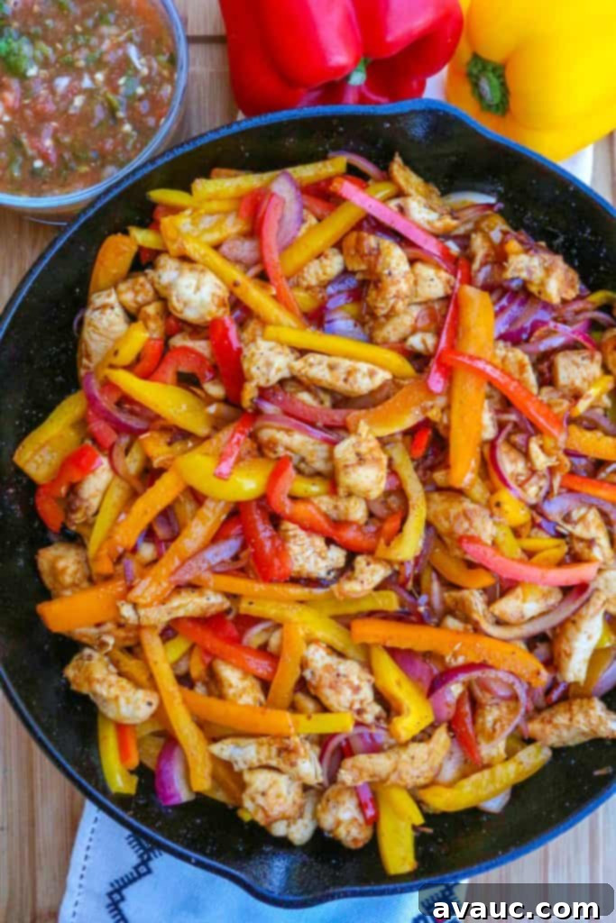 Sizzling Skillet Chicken Fajitas 2 Skillet chicken fajitas in a cast-iron skillet