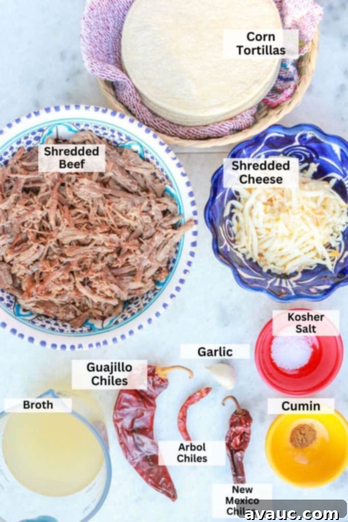 Classic Shredded Beef Enchiladas Rojas 3 Key ingredients for making Enchiladas Rojas: corn tortillas, shredded beef, shredded cheese, broth, salt, cumin, guajillo chiles, arbol chiles, New Mexico chiles, garlic clove, and onion.