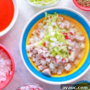 Hearty White Pozole 15 Bowl of Pozole Blanco with garnishes surrounded by small bowls with various garnishes