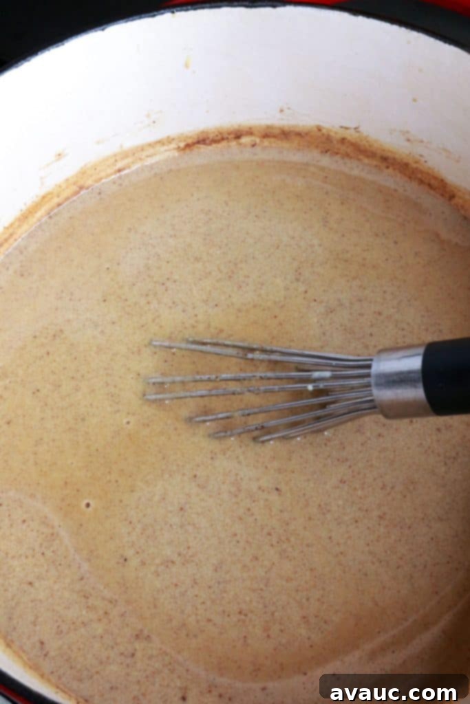 Authentic Mexican Champurrado 8 Whisking champurrado
