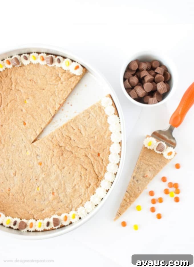 Forget the store bought! This Easy Homemade Reeses Peanut Butter Cookie Cake by @designeatrepeat is easy to whip up and just as tasty as its premade competition! Mmm!