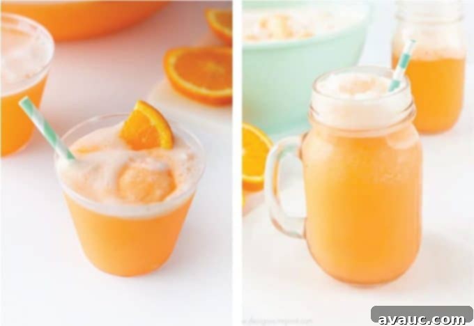Creamy Orange Fizz 8 A table set with cups next to a punch bowl of Orange Sherbet Punch, inviting guests to serve themselves.