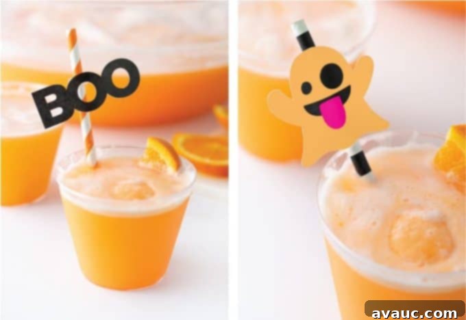 Creamy Orange Fizz 9 Orange Sherbet Punch with Halloween-themed drink toppers featuring 'BOO' and an emoji ghost.