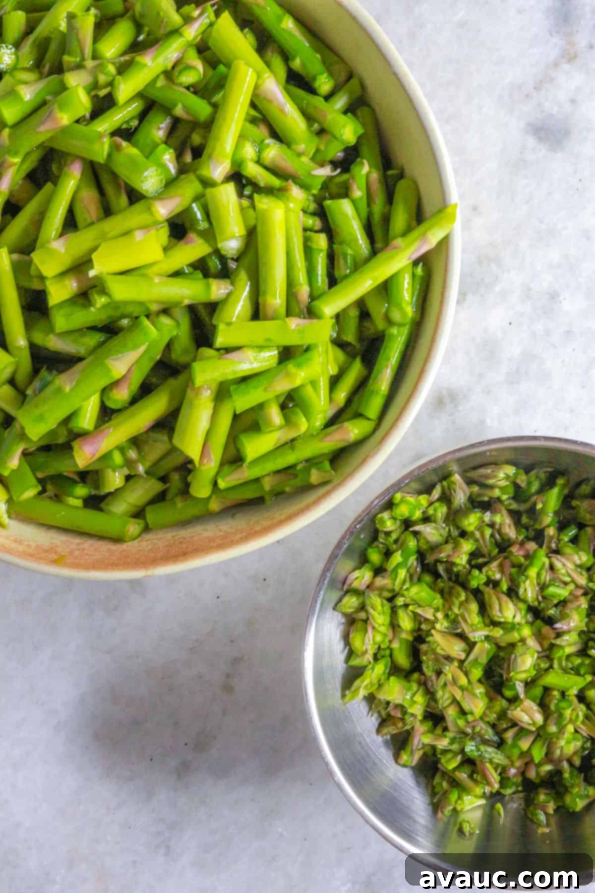 Creamy Dairy-Free Asparagus Soup 4 two bowl with cut asparagus