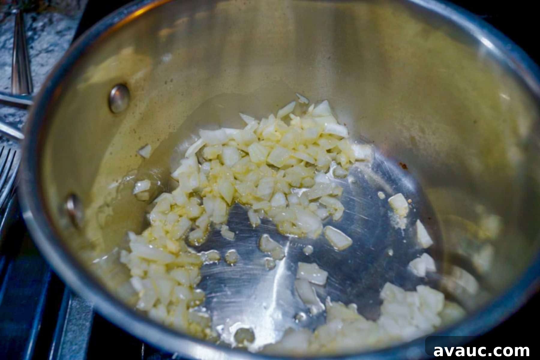 Zesty Green Chile and Melted Cheese 6 Sautéing diced onion and garlic in a pot
