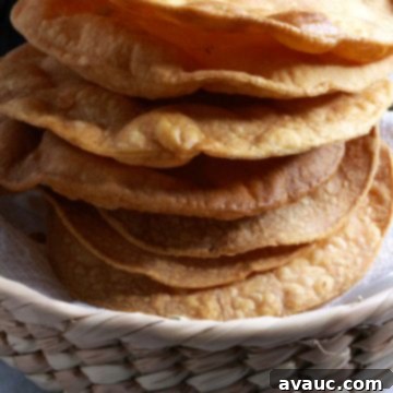 Homemade Tostada Shells Made Easy 11 Stacked homemade tostada shells, perfectly golden and ready for topping