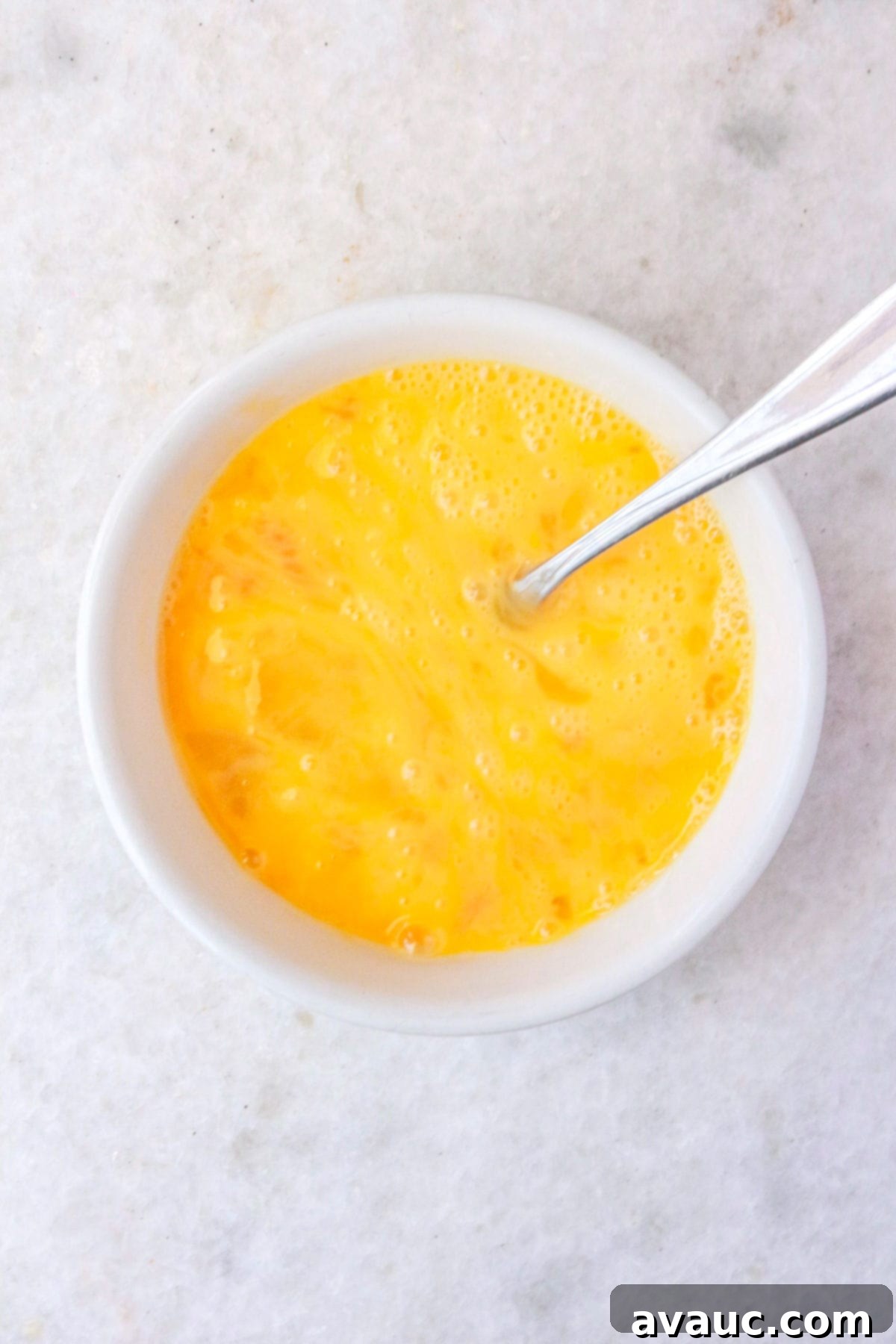 Mexican Scrambled Eggs 6 Small bowl with raw scrambled eggs