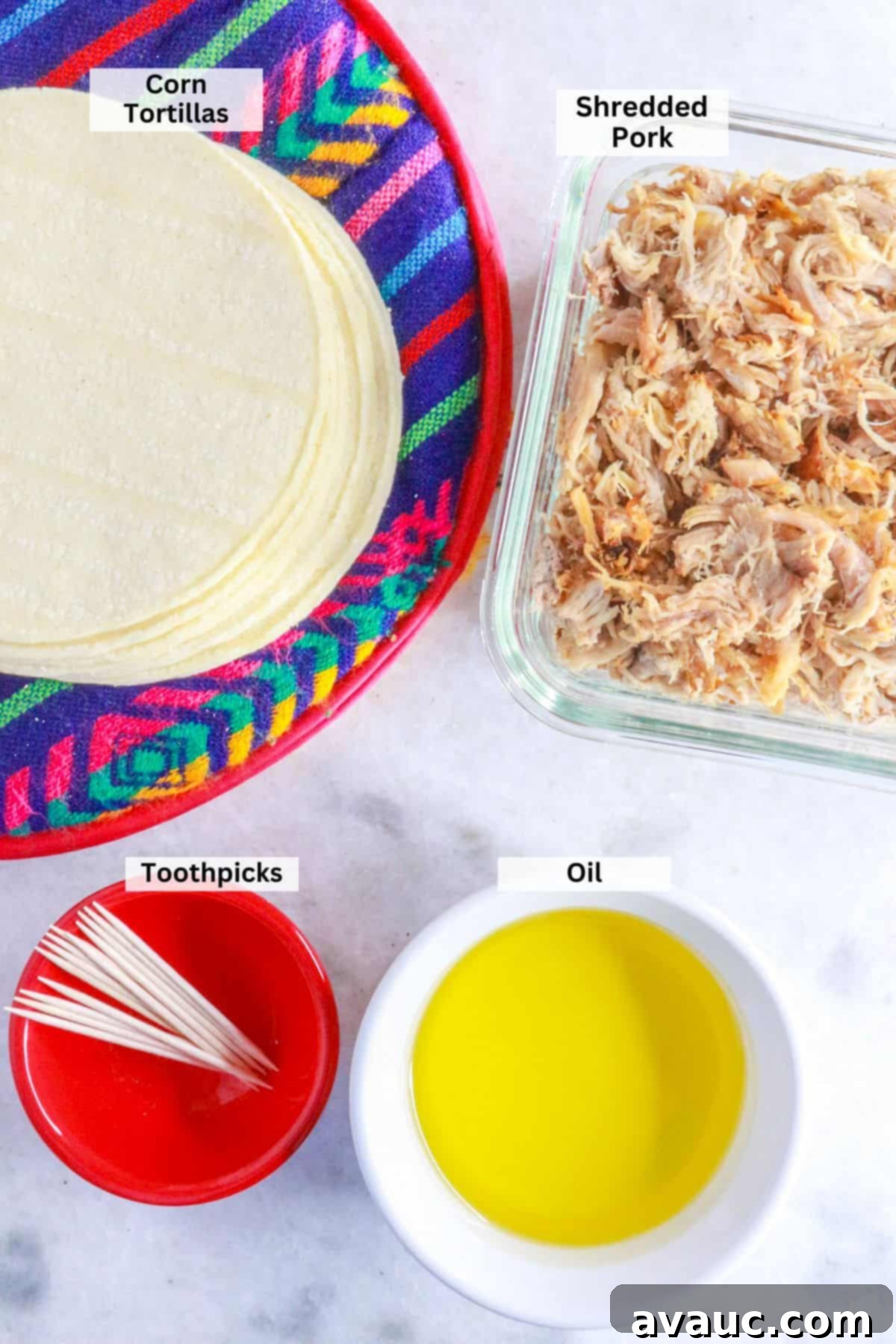 Ingredients for flautas de puerco: corn tortillas, shredded pork, oil, toothpicks