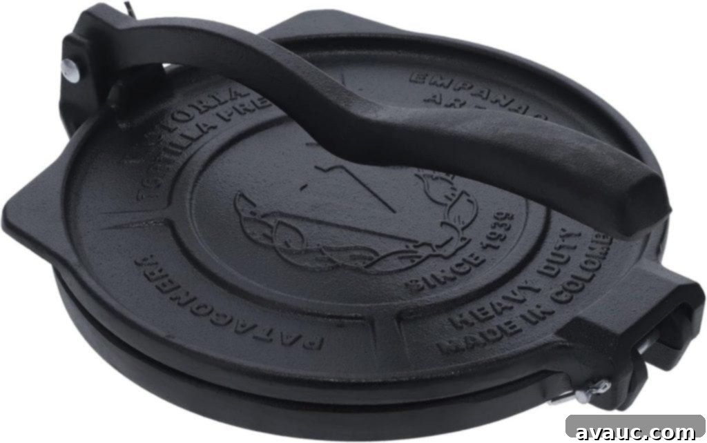 Delightful Gluten-Free Pineapple Empanadas 15 An open tortilla press with a flattened dough circle, demonstrating its use for empanadas