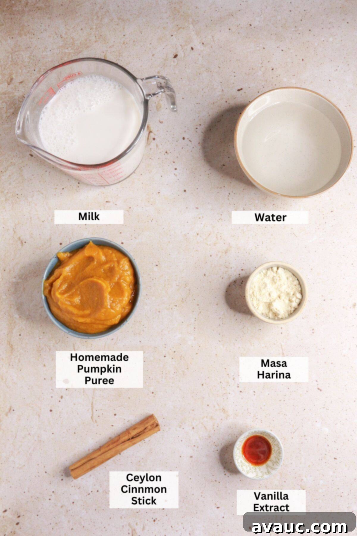 Ingredients for atole de calabaza: milk, water, pumpkin puree, masa harina, cinnamon stick, vanilla
