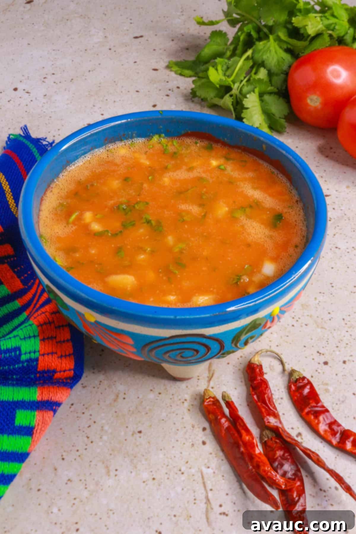 Chile de Arbol Salsa: A Fiery Tomato Delight 2 Chile de arbol salsa with tomato in a salsa bowl