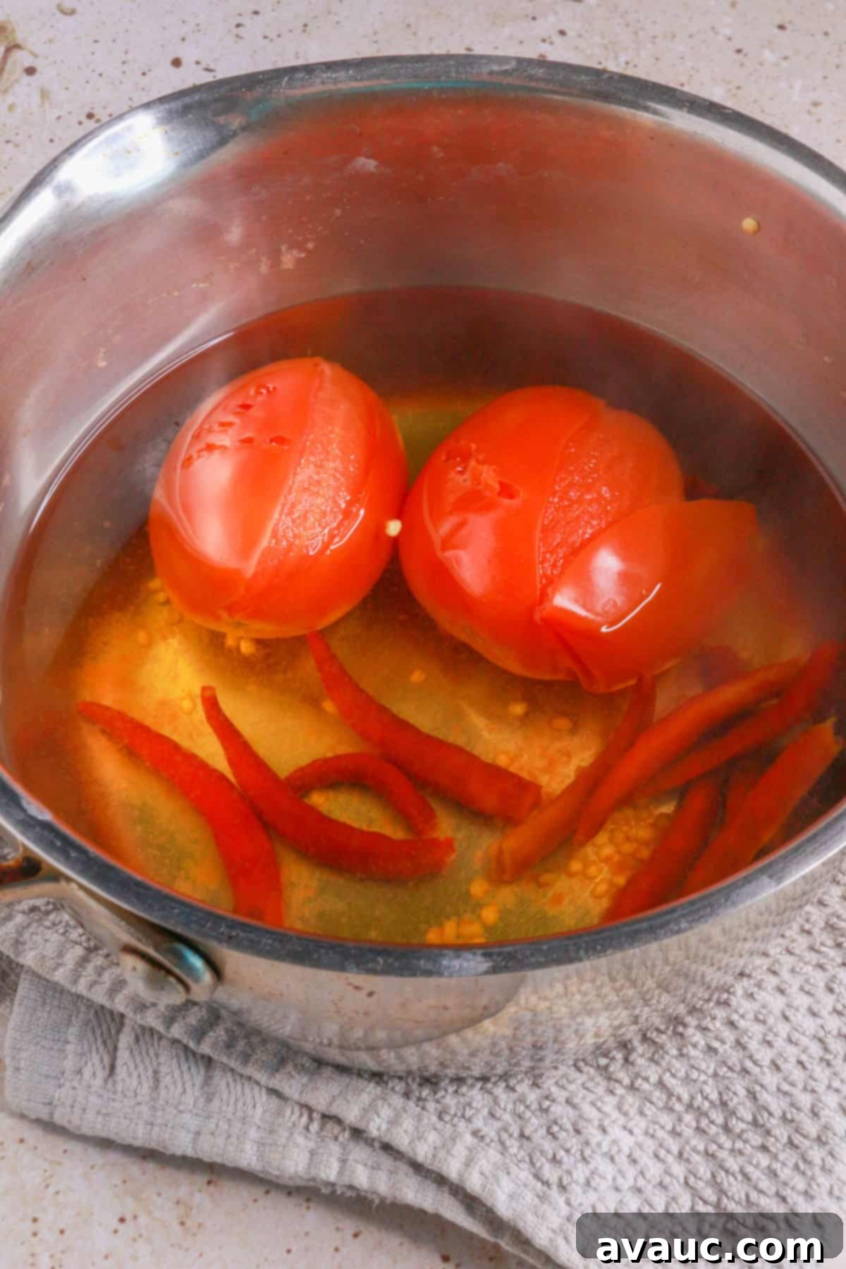 Chile de Arbol Salsa: A Fiery Tomato Delight 4 boiled Roma tomatoes and chiles de arbol in a small saucepan