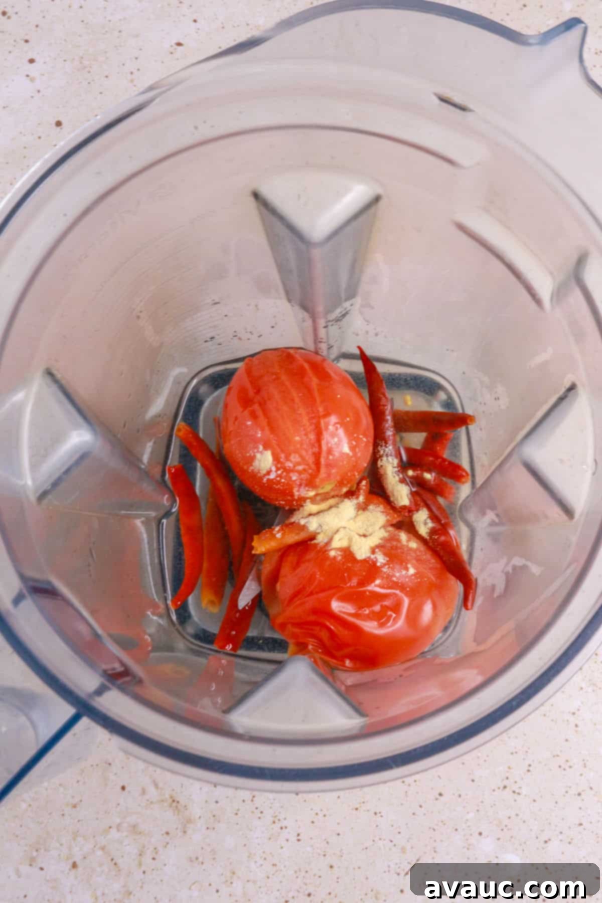 Chile de Arbol Salsa: A Fiery Tomato Delight 5 chiles de arbol, tomatoes and garlic powder in a blender